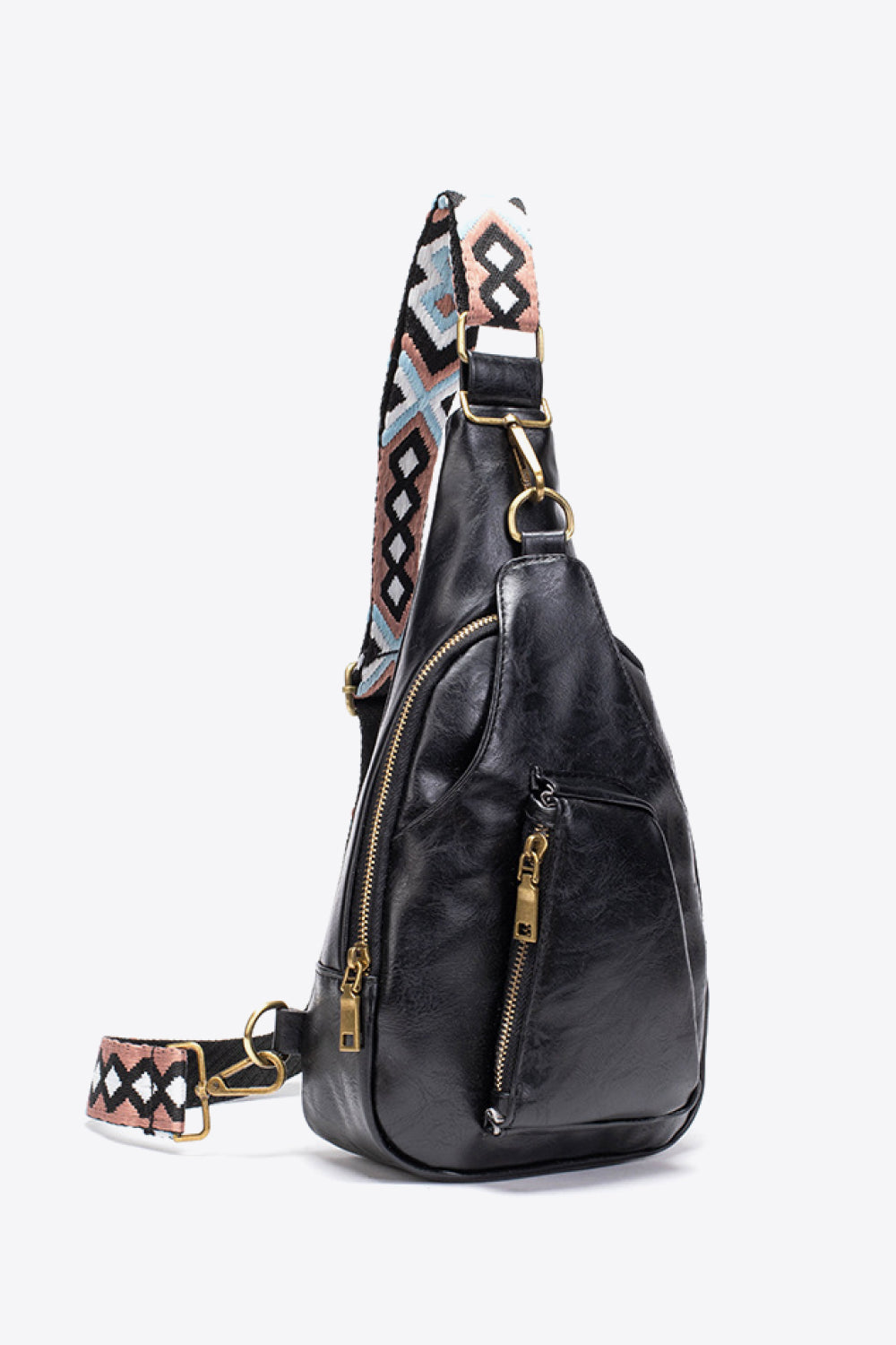 All The Feels PU Leather Sling Bag with adjustable strap and decorative patterned details, shown in profile view.