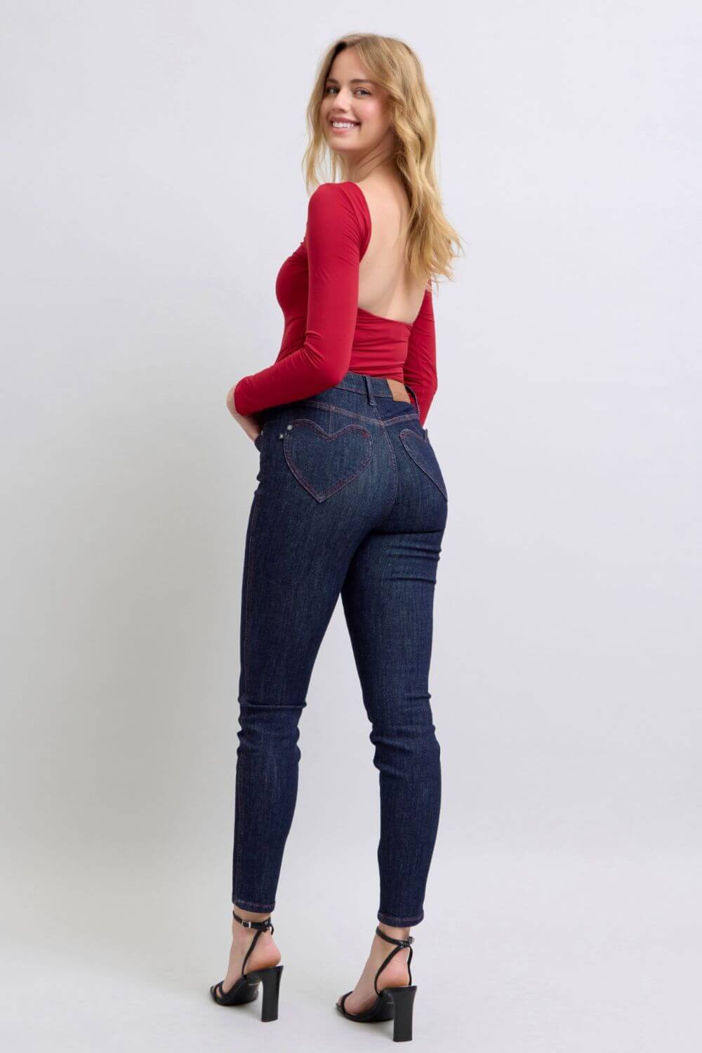 Judy Blue full-size skinny jeans with heart-shaped back pockets, offering a flattering fit and playful design, available at 6i6.com