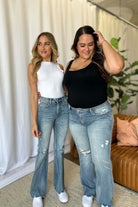Judy Blue full-size medium rise tummy control destroy flare jeans with a flattering fit and distressed details, available at 6i6.com