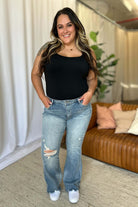 Judy Blue full-size medium rise tummy control destroy flare jeans with a flattering fit and distressed details, available at 6i6.com