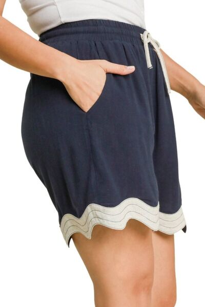 Umgee Full-Size Color-Blocked Scalloped Hem Shorts in plus size for women from 6i6.com, perfect for summer outfits or casual wear.