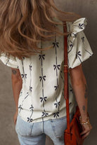 Bow Print Tie Neck Short Sleeve Blouse for women from 6i6.com, a stylish and versatile top for casual or office wear.