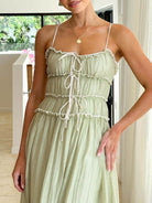 Devine frill ruffled hem midi cami dress with a flattering fit and elegant ruffled details, perfect for a casual or semi-formal look, available at 6i6.com