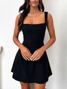 Devine bow back square neck mini dress with a chic and playful design, perfect for any occasion, available at 6i6.com