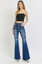 RISEN distressed button-fly flare jeans with a trendy flare silhouette and stylish distressed details, available at 6i6.com