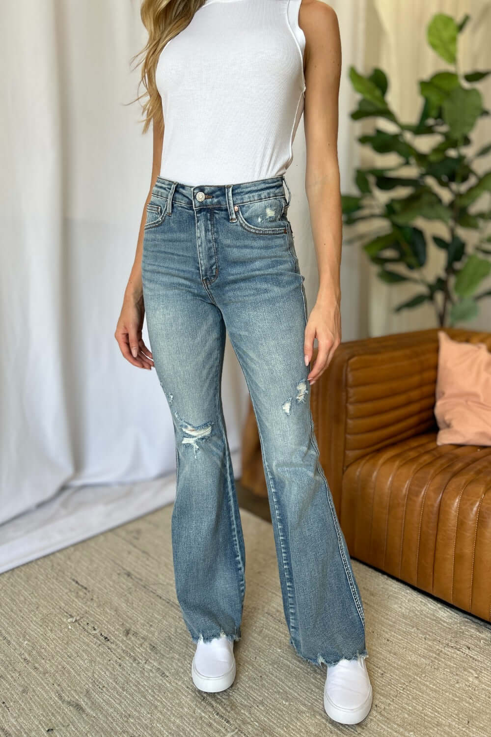 Judy Blue full-size medium rise tummy control destroy flare jeans with a flattering fit and distressed details, available at 6i6.com