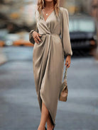 High-Low Surplice Balloon Sleeve Midi Dress for women from 6i6.com, perfect for special occasions and chic daytime looks.