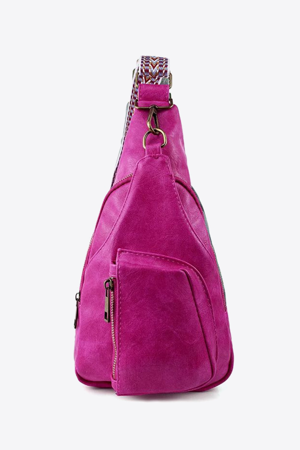 Side view of the All The Feels PU leather sling bag in vibrant pink, featuring an adjustable strap and sleek design.