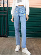 Heart-shaped detail on straight leg jeans with side pockets, designed for a stylish and comfortable fit, available at 6i6.com