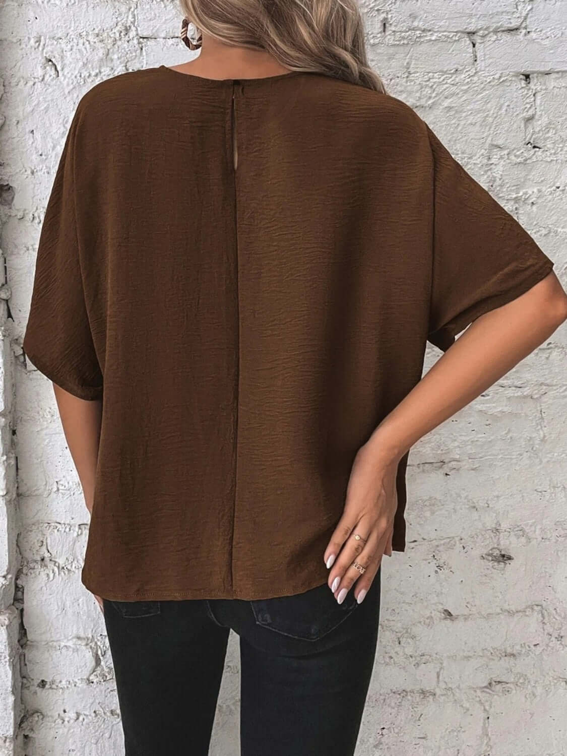 Knotted round neck half sleeve blouse with a trendy knot detail for a chic and casual look, available at 6i6.com