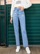 Heart-shaped detail on straight leg jeans with side pockets, designed for a stylish and comfortable fit, available at 6i6.com