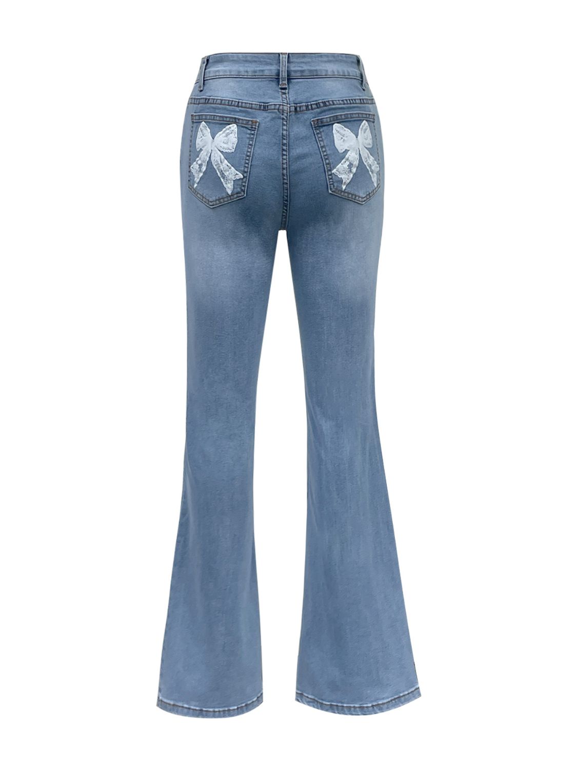 Bow back flare jeans with a feminine, playful design and a flattering fit, available at 6i6.com