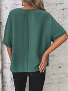 Knotted round neck half sleeve blouse with a trendy knot detail for a chic and casual look, available at 6i6.com