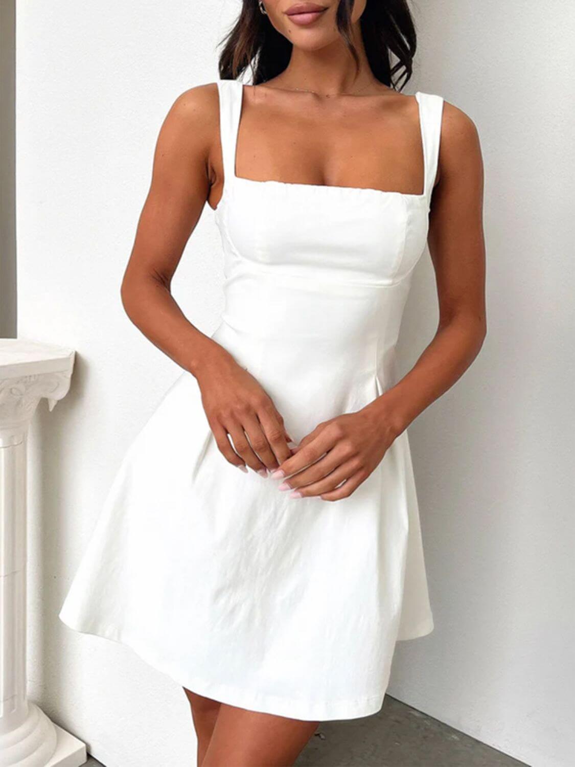 Devine bow back square neck mini dress with a chic and playful design, perfect for any occasion, available at 6i6.com