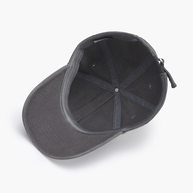 Inside view of adjustable cotton baseball hat showcasing its structure and detailing.