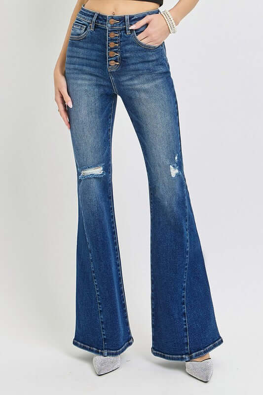 RISEN distressed button-fly flare jeans with a trendy flare silhouette and stylish distressed details, available at 6i6.com