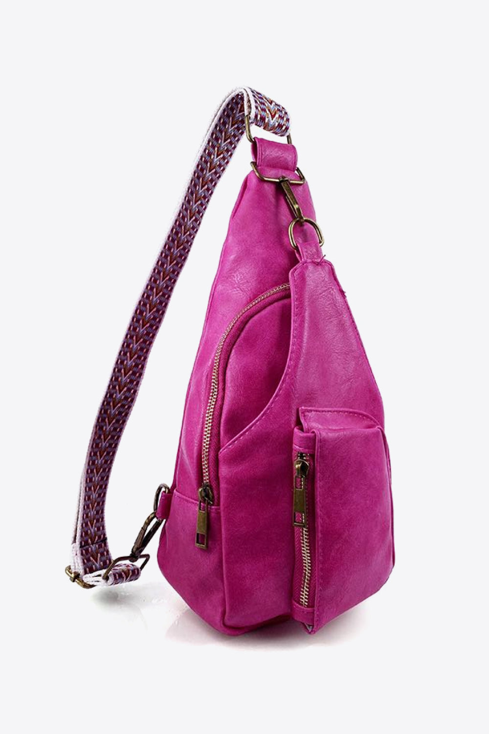 All The Feels PU Leather Sling Bag in vibrant pink with adjustable strap, featuring multiple zippered pockets and ghost mannequin styling.