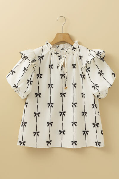 Bow Print Tie Neck Short Sleeve Blouse for women from 6i6.com, a stylish and versatile top for casual or office wear.
