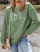 LUCKY rhinestone round neck long sleeve sweatshirt with sparkling embellishments for a chic and comfortable look, available at 6i6.com