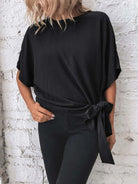 Knotted round neck half sleeve blouse with a trendy knot detail for a chic and casual look, available at 6i6.com