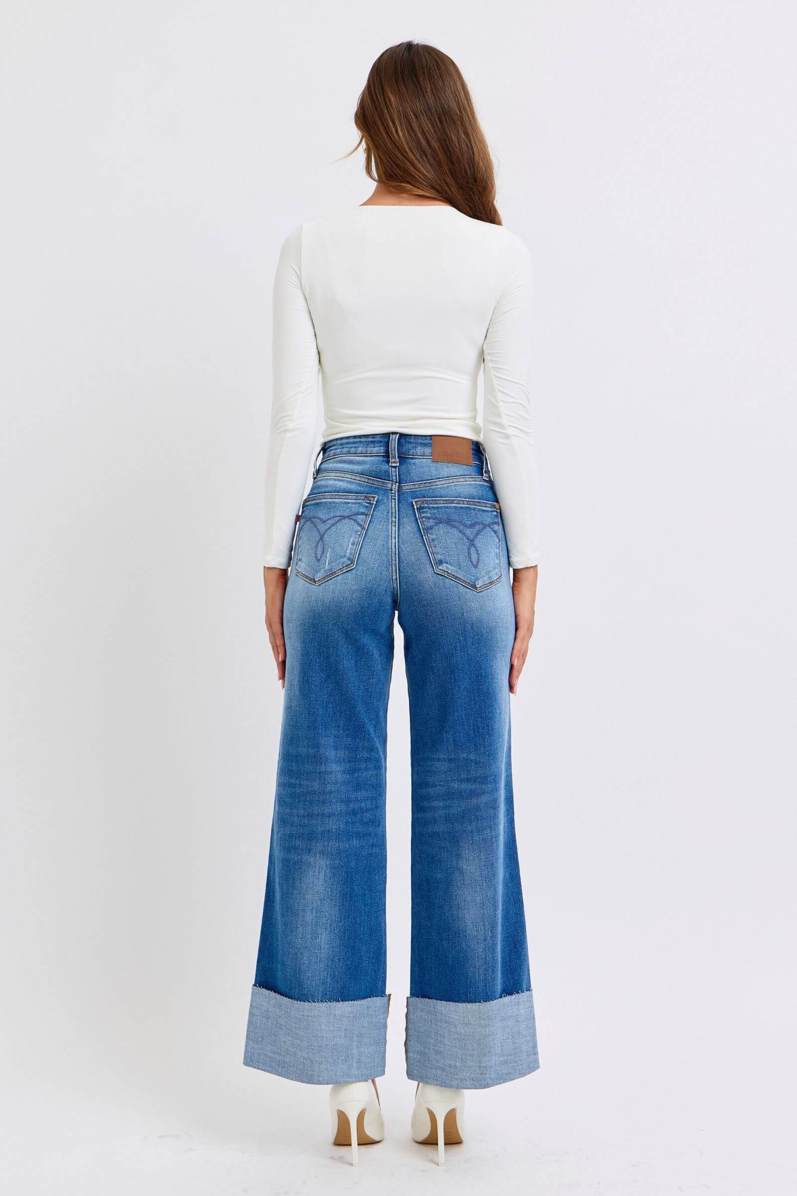 Judy Blue full-size distressed high waist wide leg jeans with a relaxed fit and stylish distressed details, available at 6i6.com