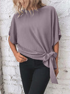 Knotted round neck half sleeve blouse with a trendy knot detail for a chic and casual look, available at 6i6.com