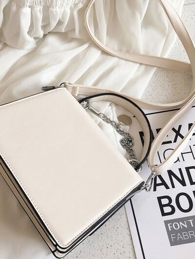 Chain PU Leather Handbag with detachable shoulder strap for women from 6i6.com, a versatile accessory for everyday or special occasions.