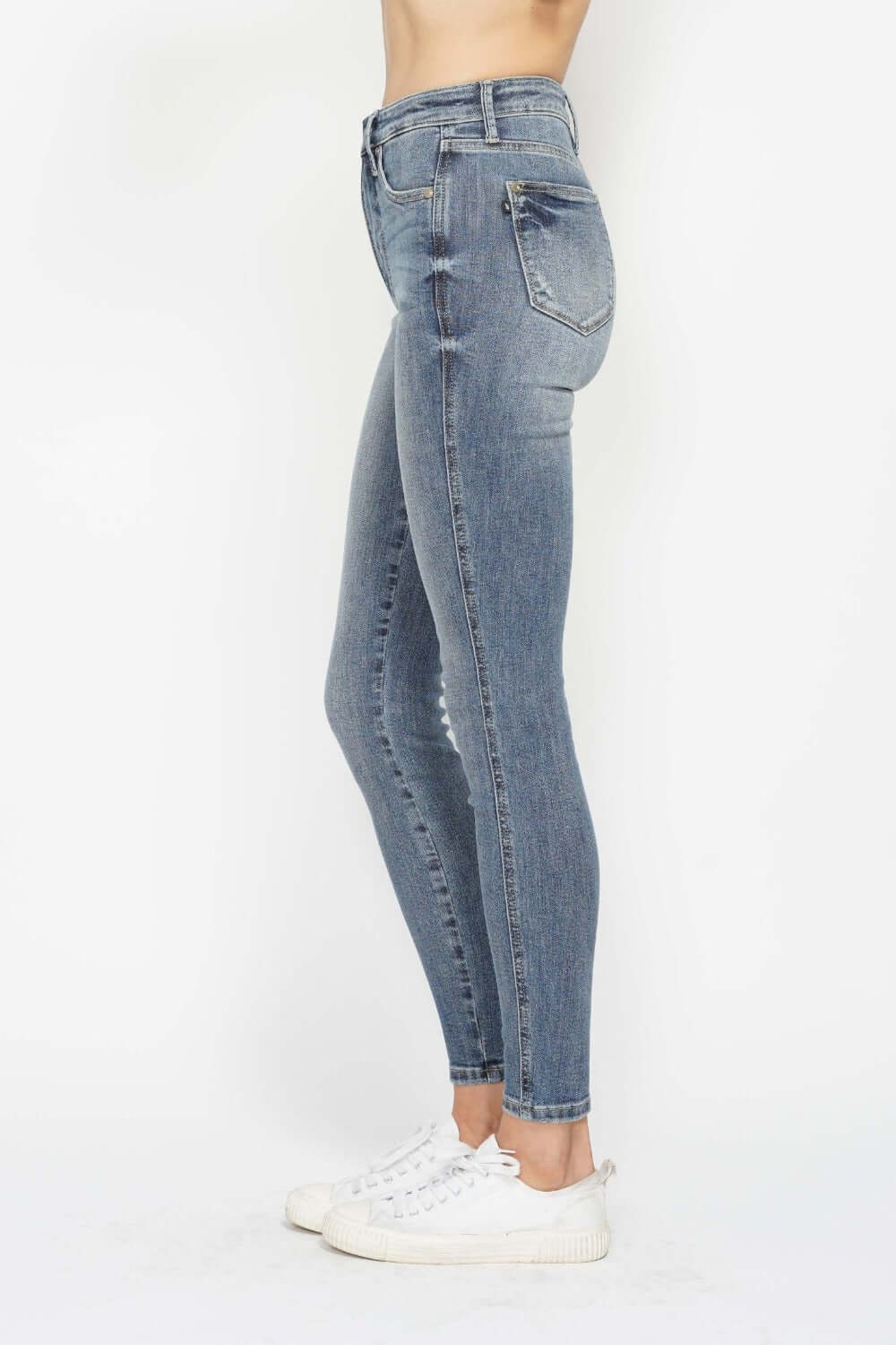 Judy Blue full-size tummy control contrast wash skinny jeans with a sleek fit and stylish detailing, available at 6i6.com