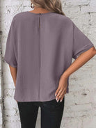 Knotted round neck half sleeve blouse with a trendy knot detail for a chic and casual look, available at 6i6.com