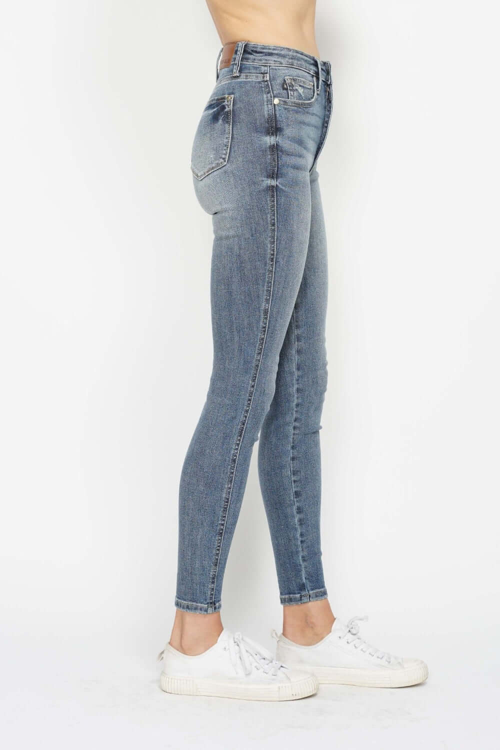 Judy Blue full-size tummy control contrast wash skinny jeans with a sleek fit and stylish detailing, available at 6i6.com