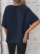 Knotted round neck half sleeve blouse with a trendy knot detail for a chic and casual look, available at 6i6.com