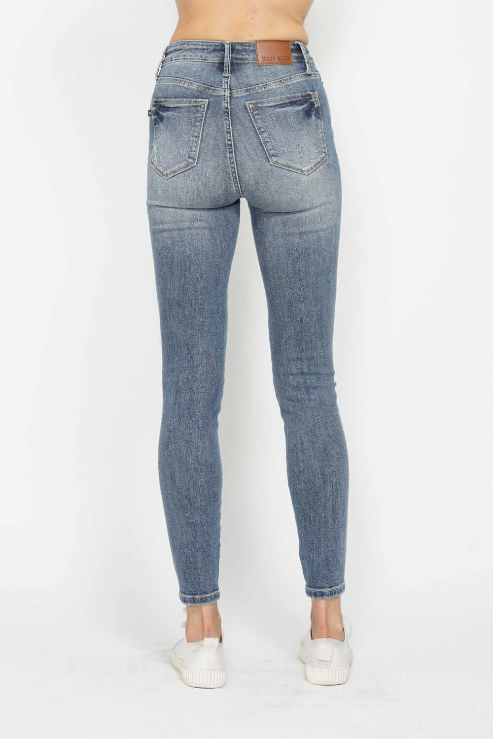Judy Blue full-size tummy control contrast wash skinny jeans with a sleek fit and stylish detailing, available at 6i6.com