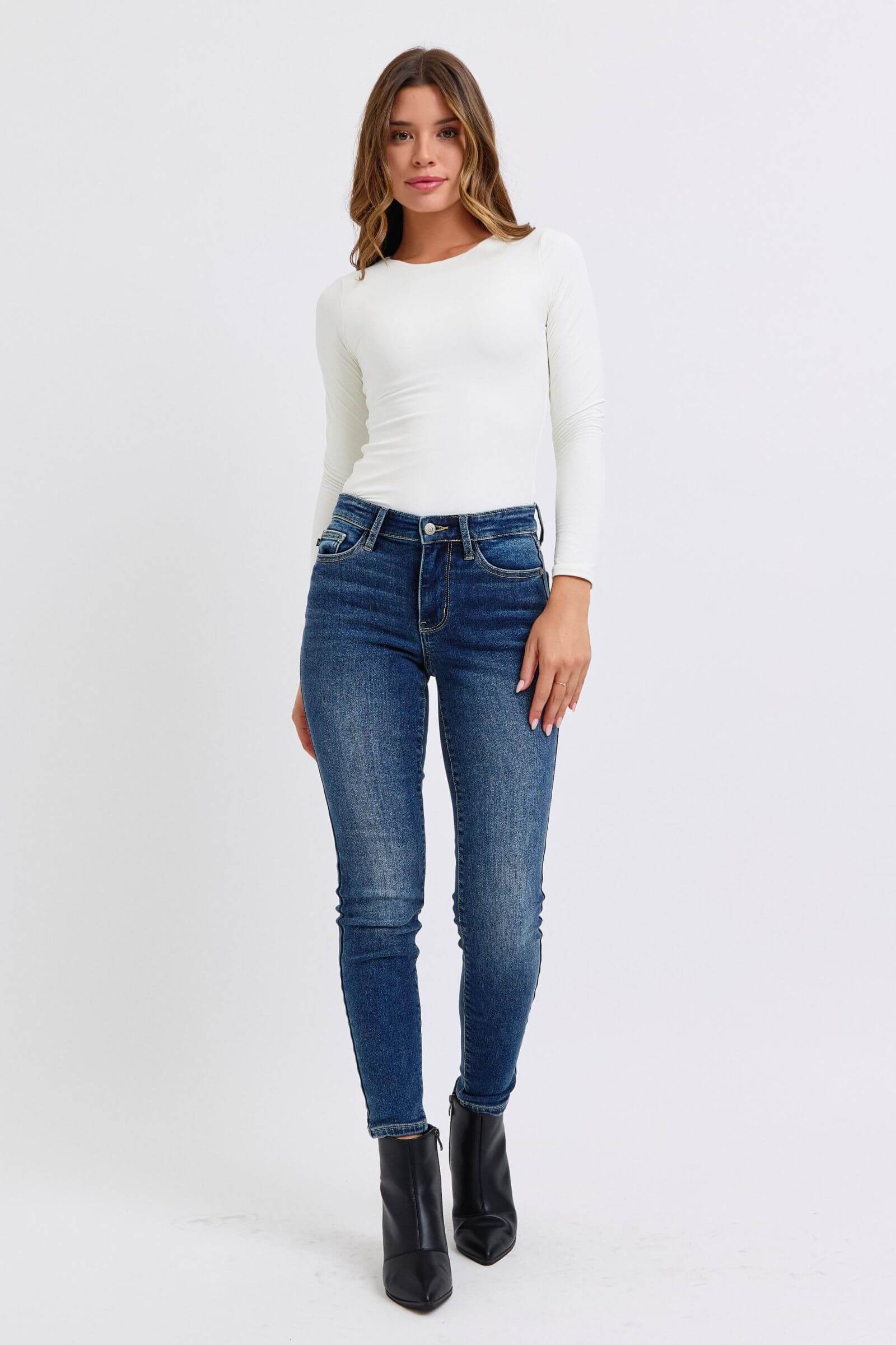 Judy Blue full-size run mid-rise waist skinny jeans with thermal lining for extra warmth and a flattering fit, available at 6i6.com