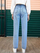 Heart-shaped detail on straight leg jeans with side pockets, designed for a stylish and comfortable fit, available at 6i6.com