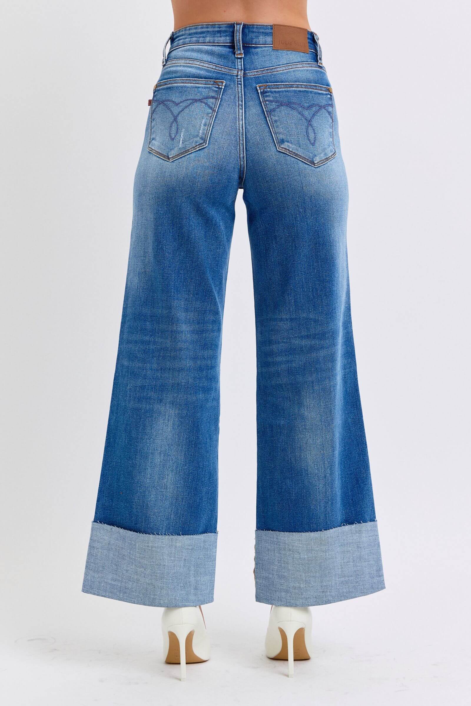 Judy Blue full-size distressed high waist wide leg jeans with a relaxed fit and stylish distressed details, available at 6i6.com