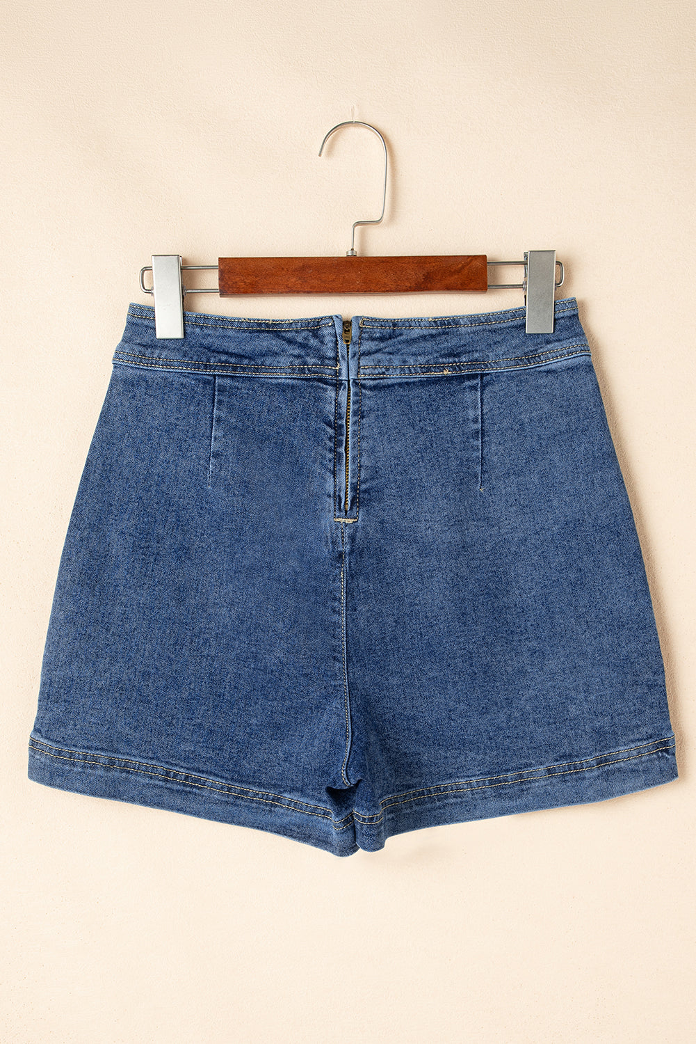 Ashleigh Blue Faux-Wrapped Mini Denim Skort for women from 6i6.com, a trendy and versatile summer piece.