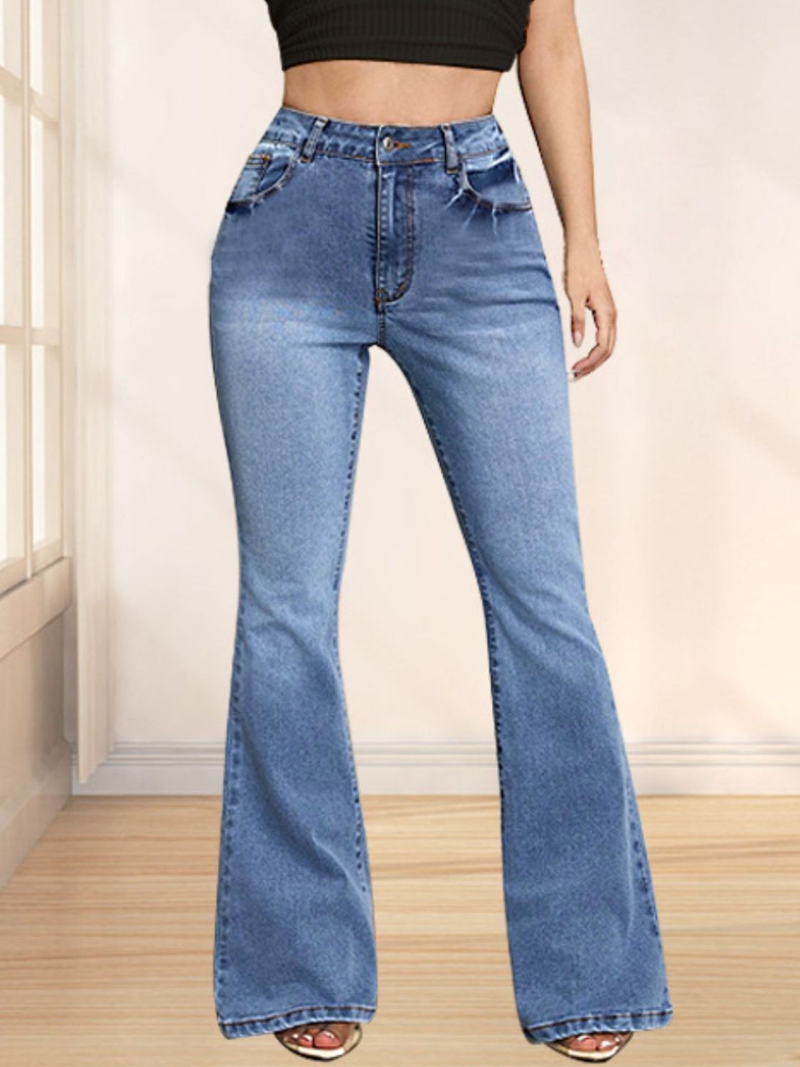 Bow back flare jeans with a feminine, playful design and a flattering fit, available at 6i6.com