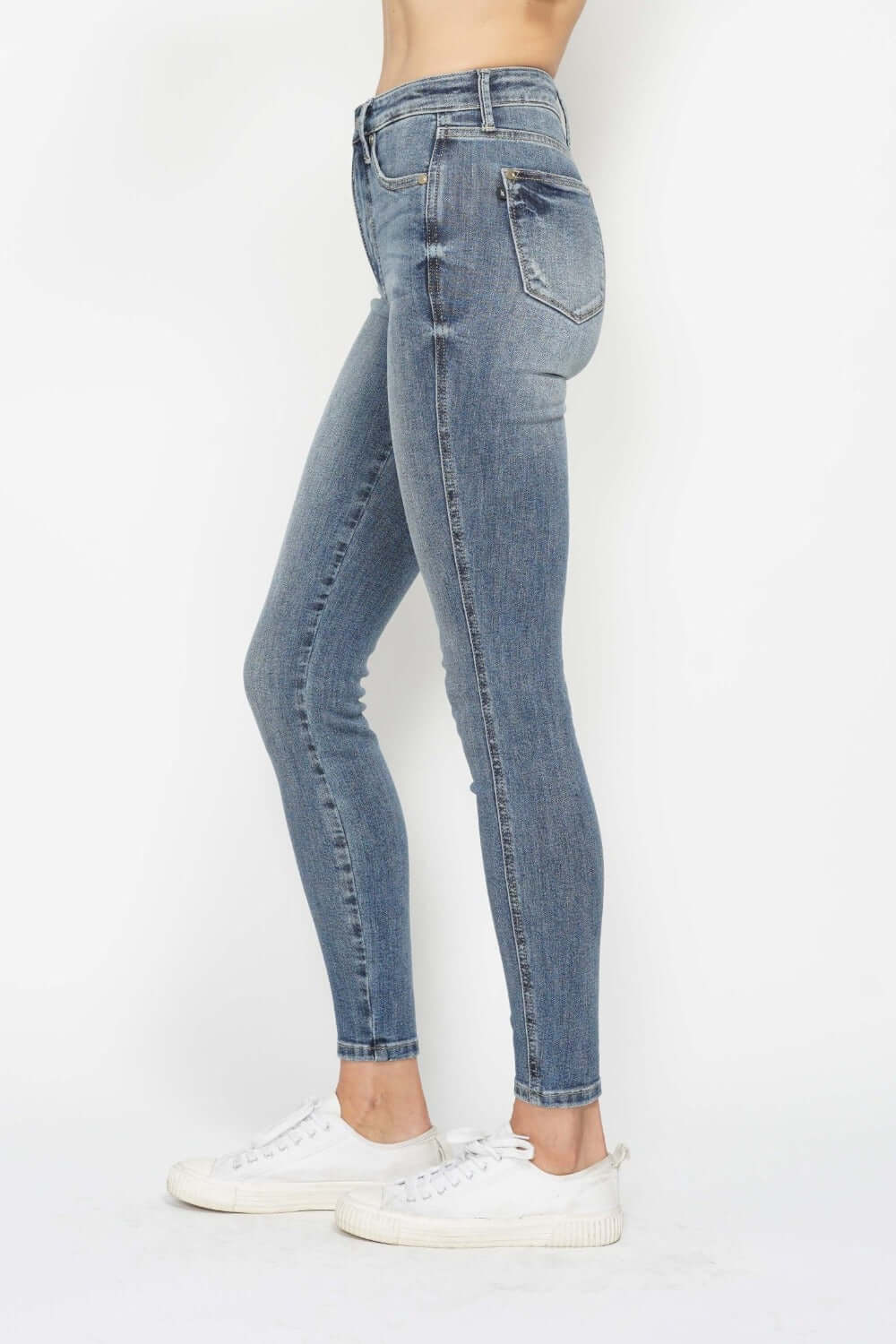 Judy Blue full-size tummy control contrast wash skinny jeans with a sleek fit and stylish detailing, available at 6i6.com
